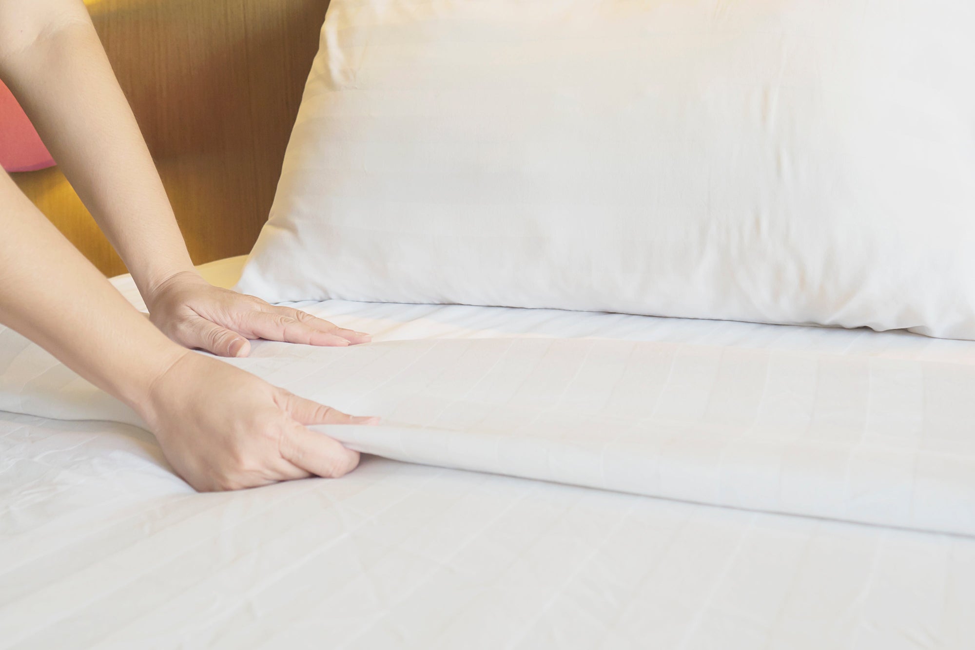 Hoeslakens wassen: zo blijft het elastiek sterk en de stof mooi - Simplewas